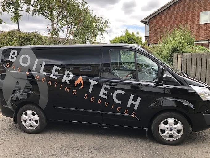 Boilertech NE van parked outside a customer's home